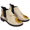 Joni Chelsea Boots, pair in three-quarter view, warm cream with a sunflower toe and peace sign, white background