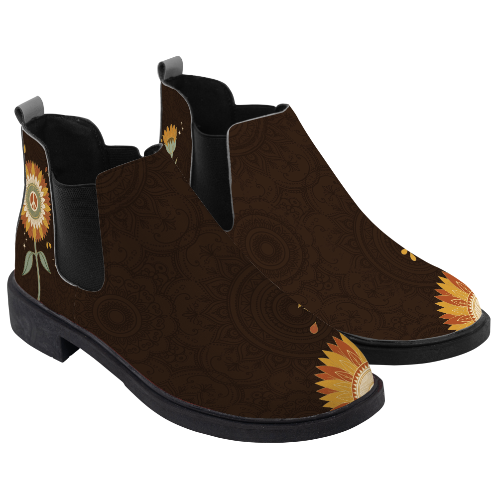Sunny Chelsea Boots, pair in three-quarter view, chocolate brown with a rising sunflower toe, white background