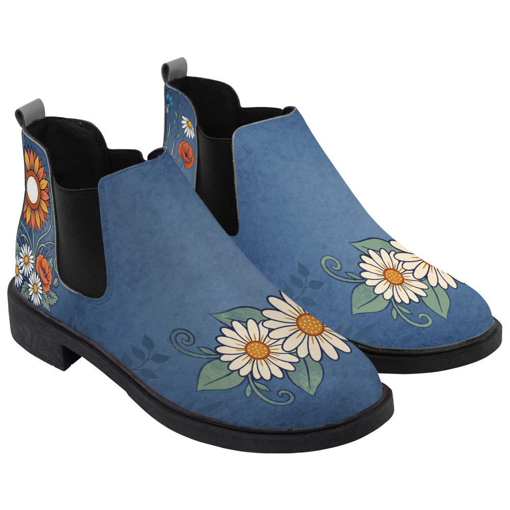 Daisy Chelsea Boots, pair in three-quarter view, washed denim blue with white daisies and poppies, white background