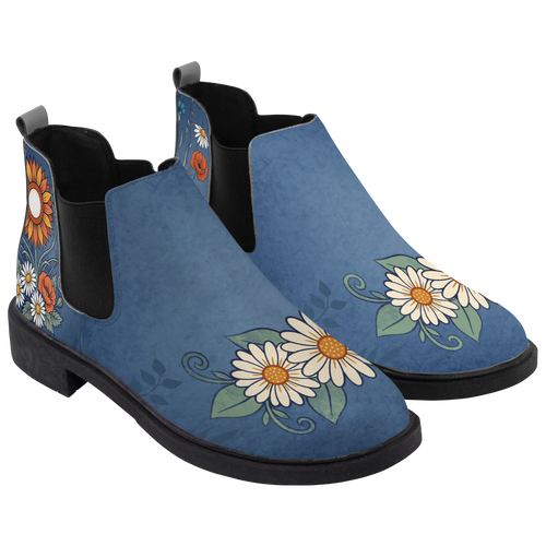 Daisy Chelsea Boots, pair in three-quarter view, washed denim blue with white daisies and poppies, white background