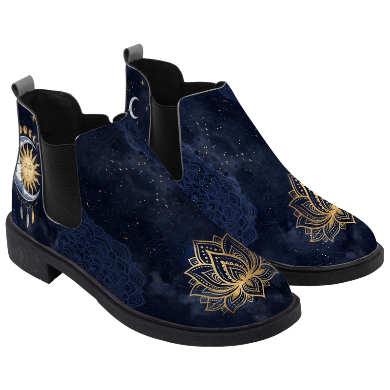 Celeste Chelsea Boots, pair in three-quarter view, midnight navy sky with a gold lotus toe, white background
