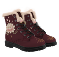 Lotus Winter Boots mockup - a pair from a three-quarter angle, wine boots with thick cream pile trim round each collar. A cream and blush lotus with sage leaves fills the side of one boot, a closed lotus bud sits on the tongue, a gold line lotus with sparks crosses each toe, and black laces through the eyelets.