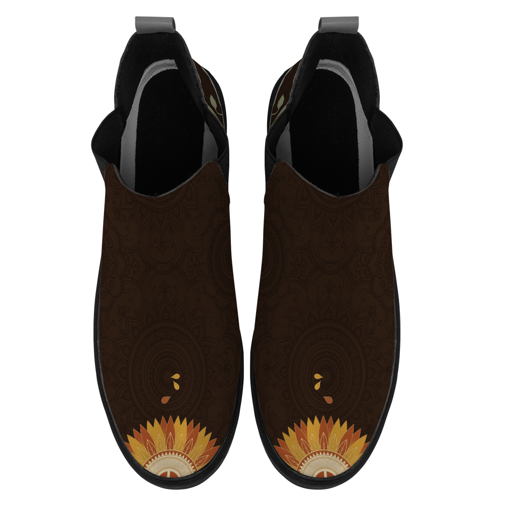 Sunny Chelsea Boots, pair from above showing the toe artwork, white background