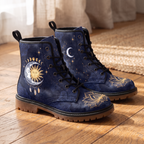 Celeste Leather Boots — styled indoors on a wood floor, celestial sun & moon design with dreamcatcher and constellations
