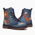Daisy Leather Boots — pair on a white background, sunflower side and wildflower meadow side, orange poppies and white daisies on denim blue