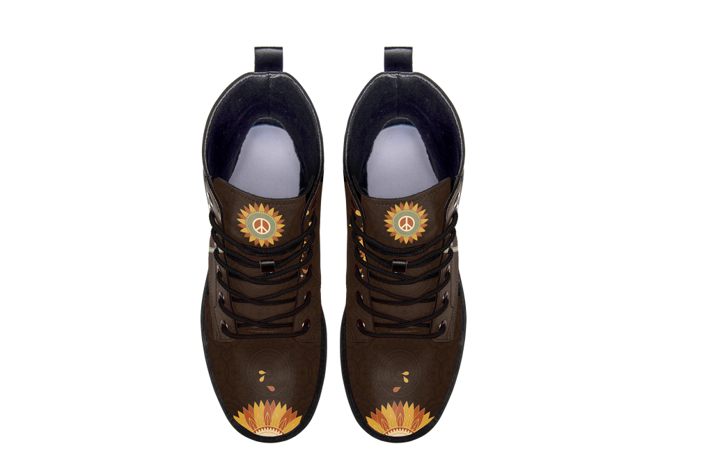 Sunny Leather Boots pair, top-down view showing the toe artwork, white background