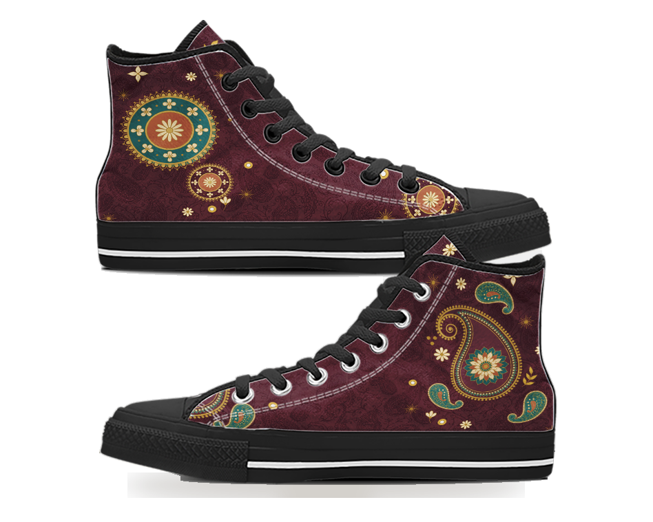 A pair of wine red high top sneakers printed with gold and teal paisley and round floral medallions, black soles