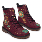 Paisley Leather Boots — a pair photographed on white showing both faces, one boot with a large gold-outlined boteh whose middle opens into a teal and cream rosette, the other with a round teal and orange medallion, deep burgundy upper